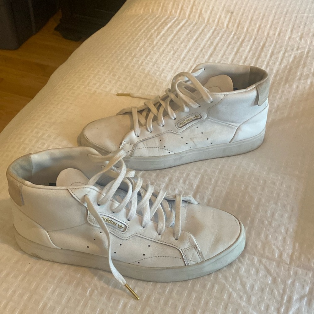 White high top Adidas sneakers